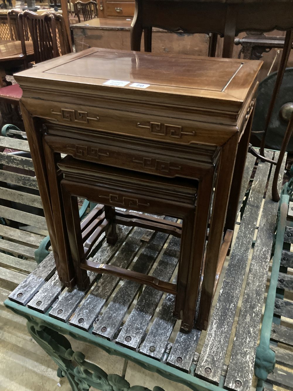 A nest of three Chinese hardwood occasional tables, largest 45 x 31cm height 59cm